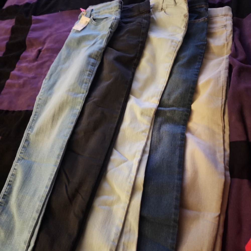 Set of Five Denim Jeans in Various Colors
